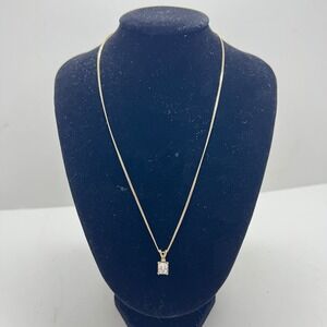 1928 Jewelry Gold Tone Emerald Cut Clear Crystal Pendant Necklace Barrel Clasp